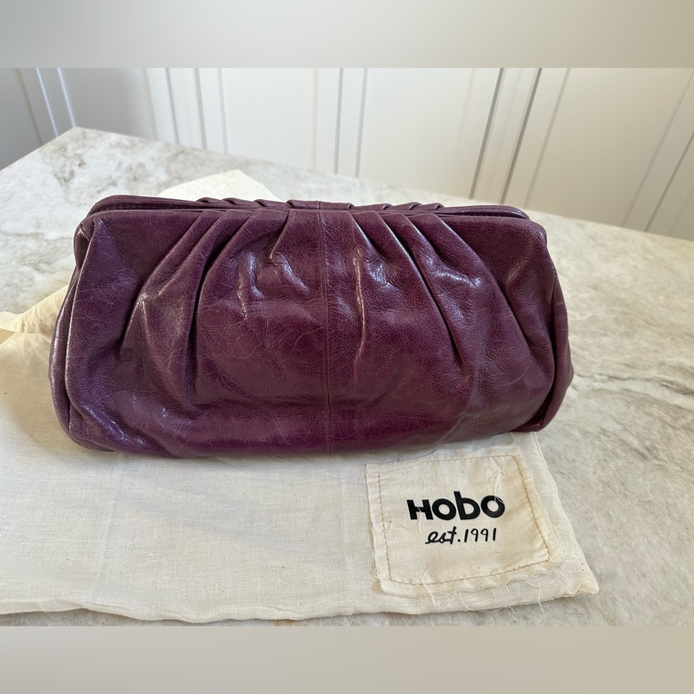 HOBO soft folded purple leather clutch with optional shoulder strap